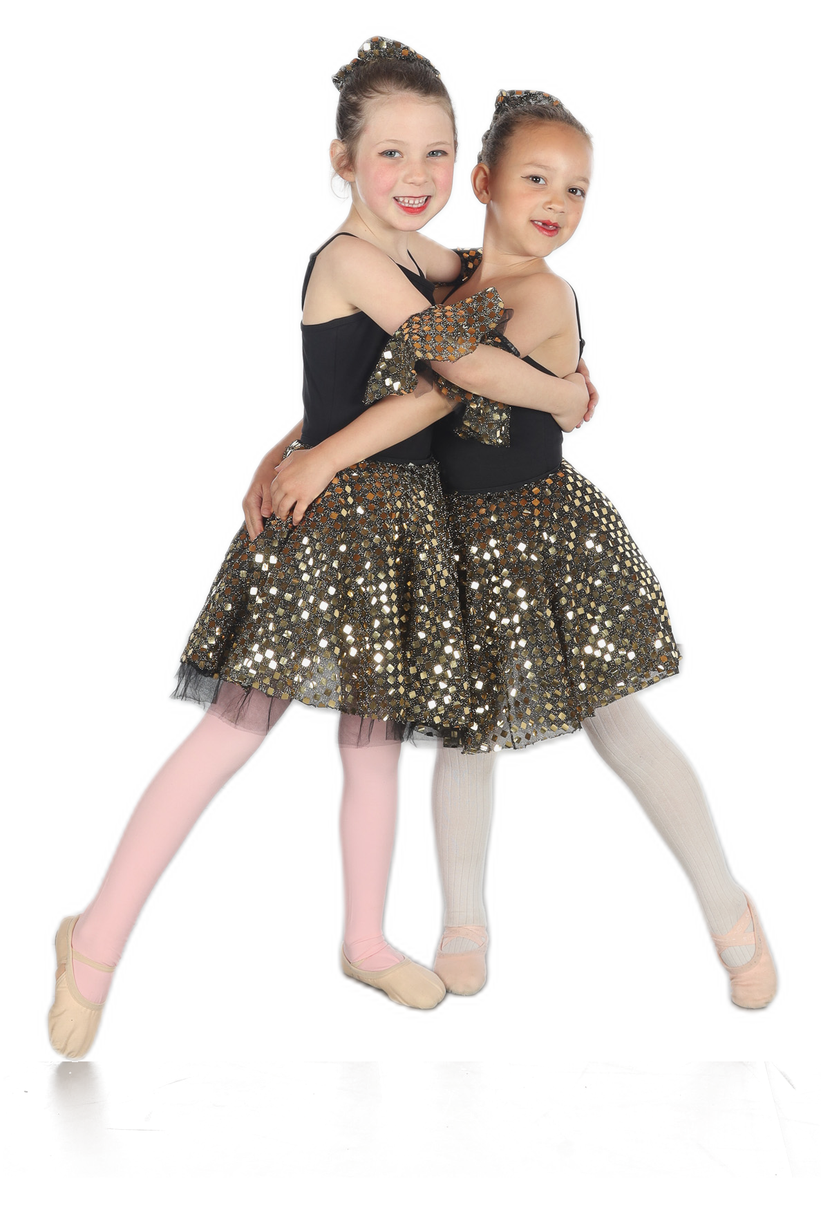 Young Cadance Academy dancers hugging in costume