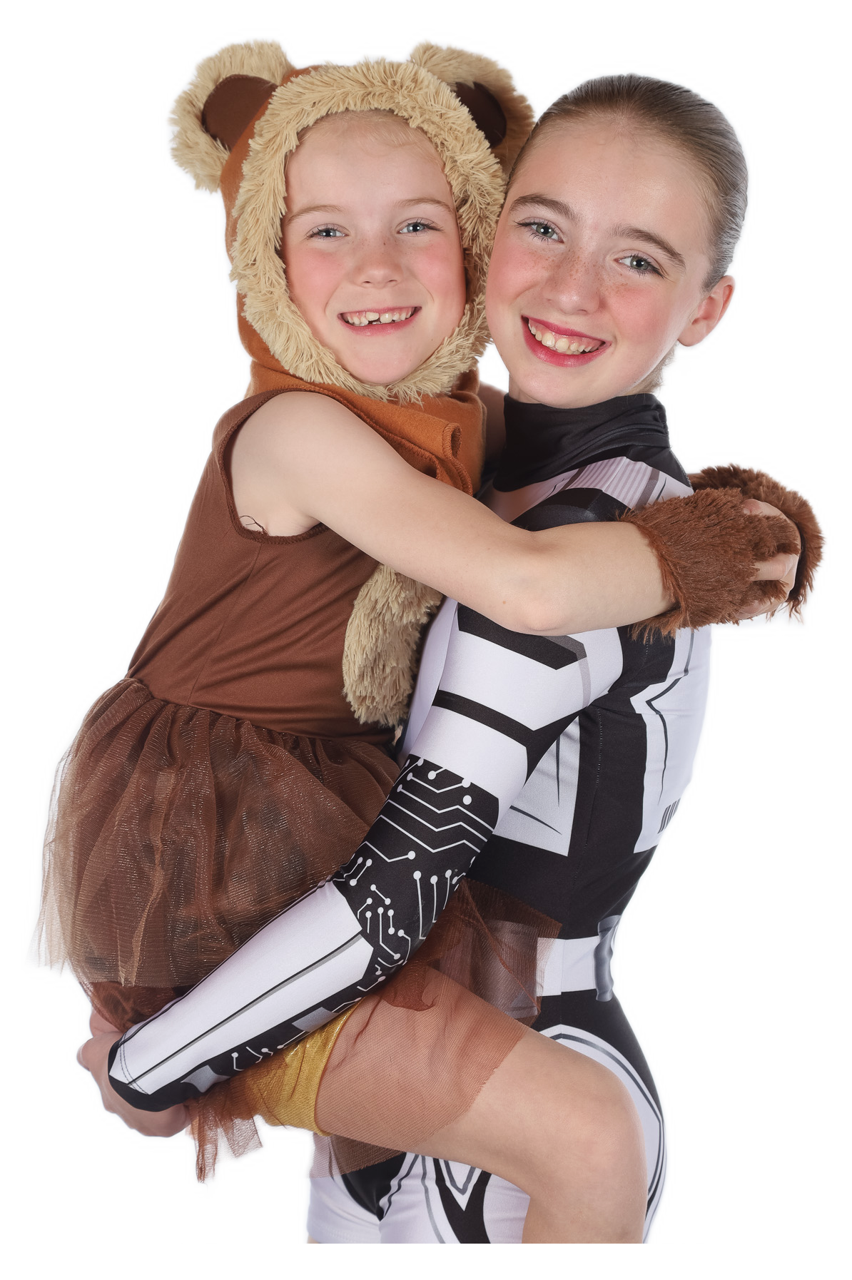 Cadance Academy dancers hugging in costume